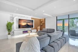 Waterfront Luxe Condo Walking Distance to Beach