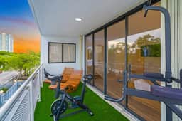 Waterfront Luxe Condo Walking Distance to Beach