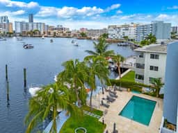 Waterfront Luxe Condo Walking Distance to Beach
